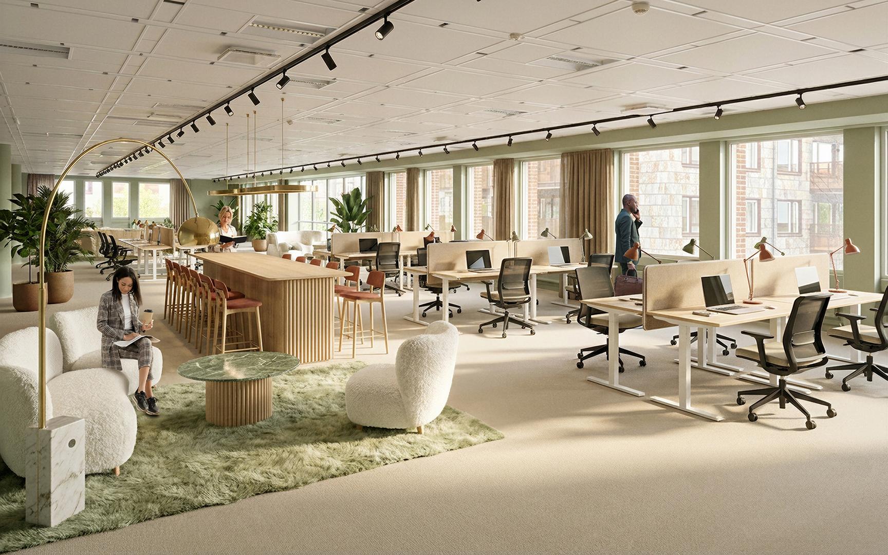 Öppet kontorslandskap med loungedel (visionsbild)